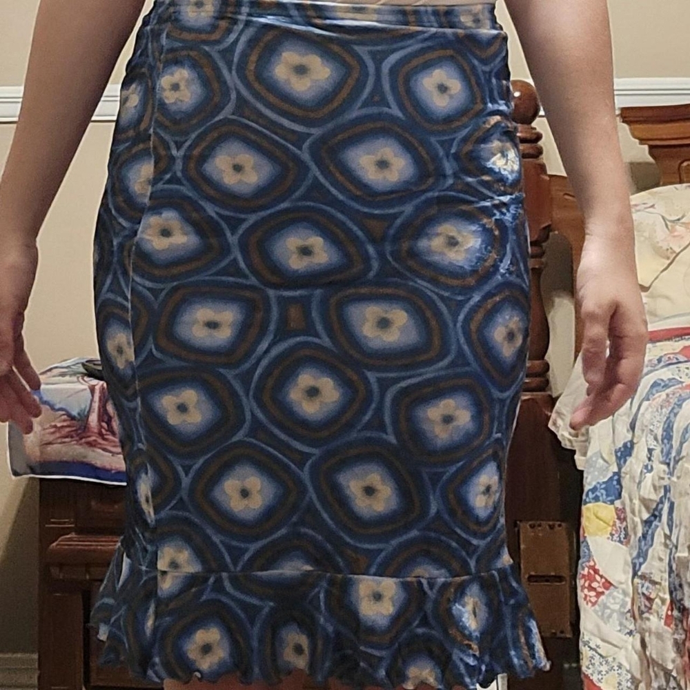Tiki brand blue and yellow patterned peplum skirt